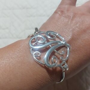 Elegant Silver Swirl Bracelet